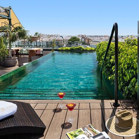 Hotel Lobby Sevilla Eksteriør bilde Rooftop pool