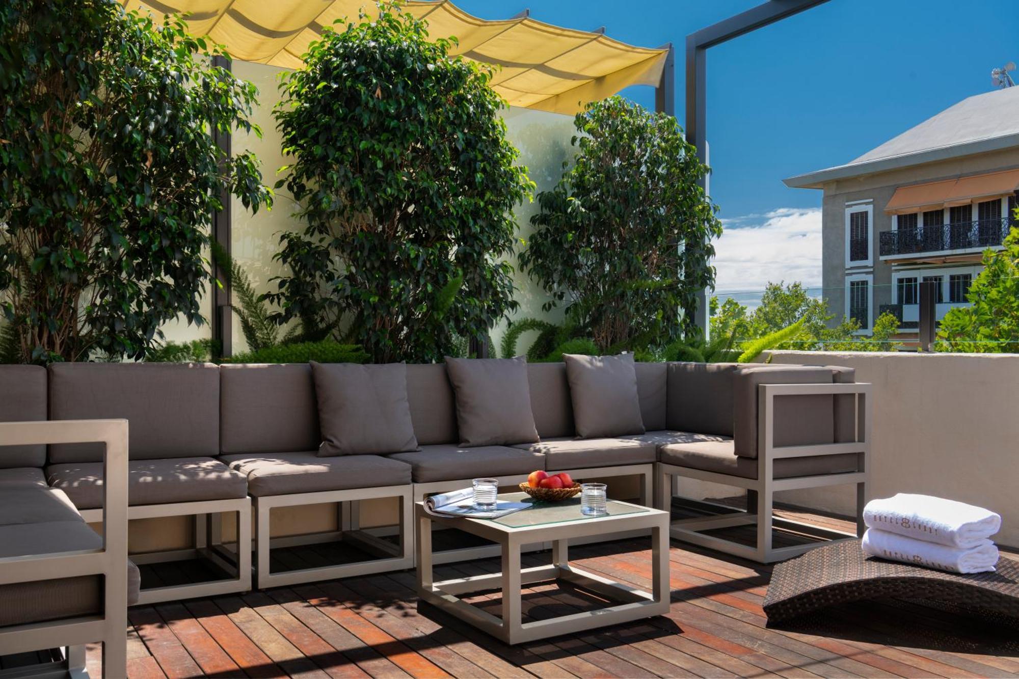 Hotel Lobby Sevilla Eksteriør bilde The hotel's rooftop